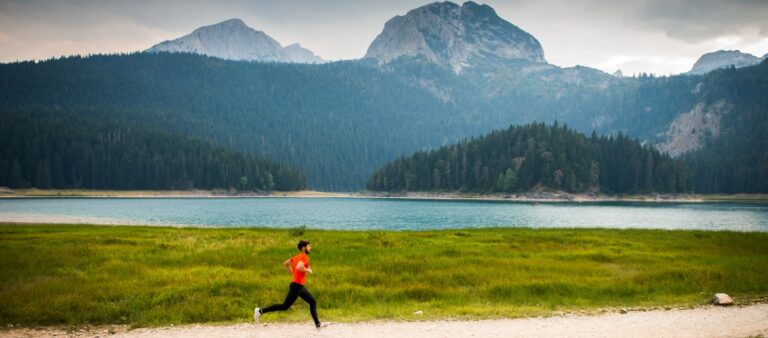 man running on nature trail