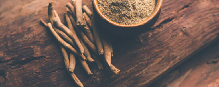 ashwagandha benefits for men, bowl of ashwagandha powder and roots