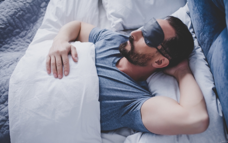man with sleeping mask sleeping man with sleeping mask sleeping